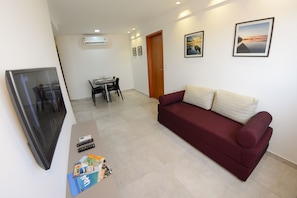 Apartment, 1 Bedroom | Living room | Flat-screen TV - Excelentes Apartamentos Maceió Jatiúca (Maceió)