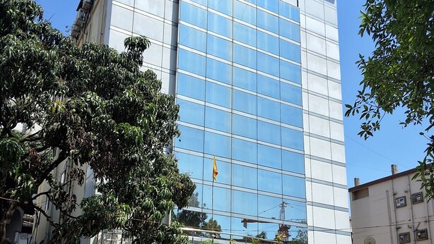 A modern hotel building with a large glass facade and a sign reading "HOTEL ACCORD". - HOTEL ACCORD (Ranchi)