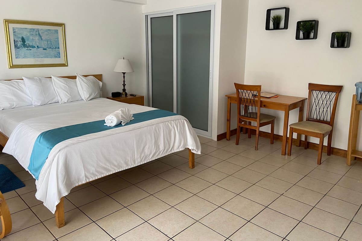 Deluxe Studio, 1 Double Bed, Non Smoking | 1 bedroom, in-room safe, individually decorated, individually furnished
