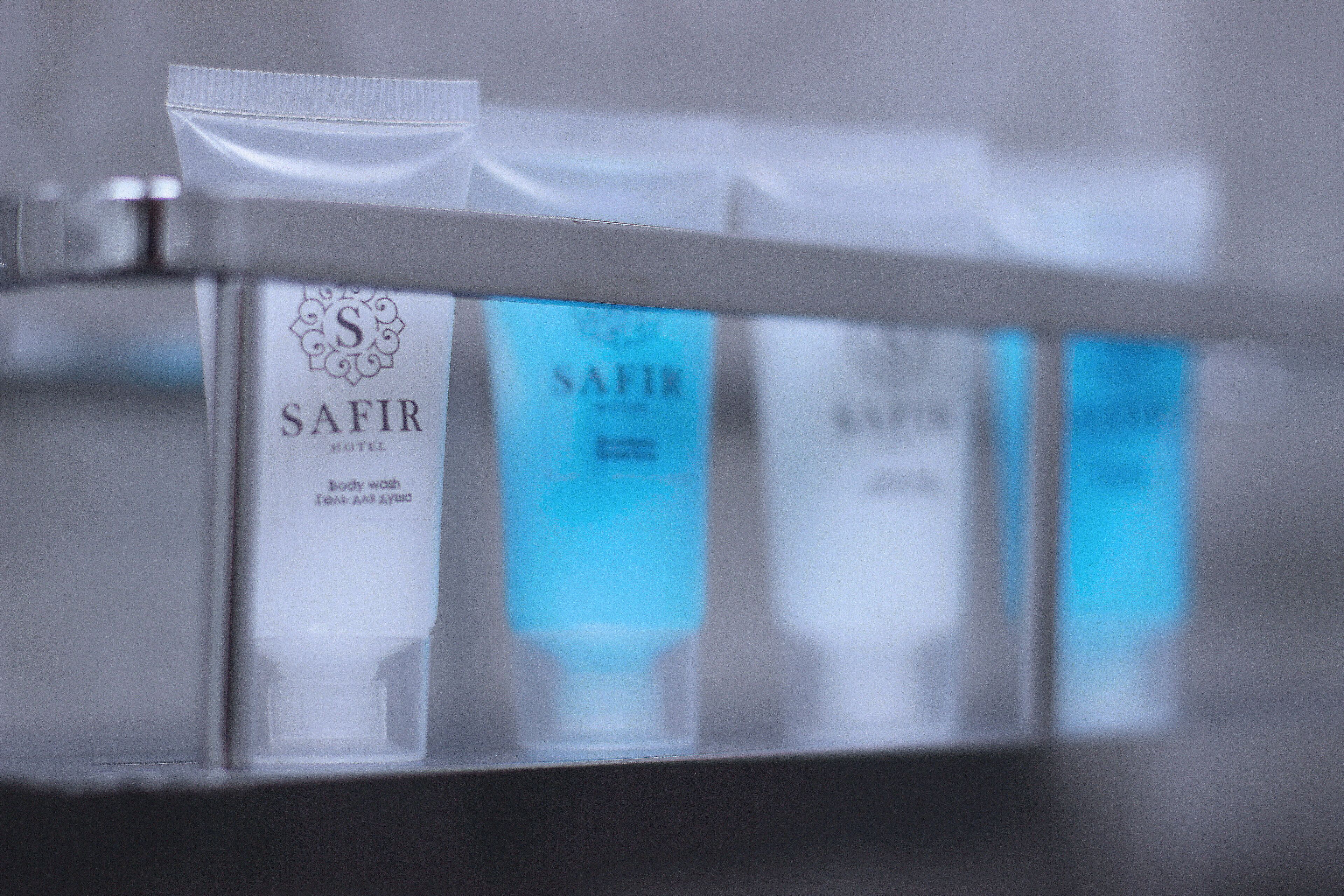 shower, bathrobes, slippers, towels