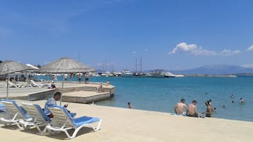 Private beach nearby, sun loungers, beach umbrellas
