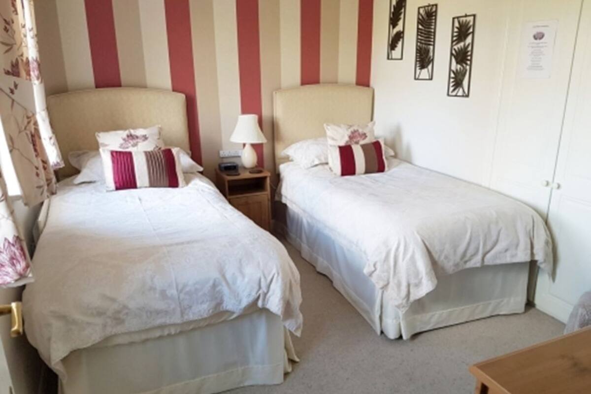 Blackout curtains, iron/ironing board, free WiFi, bed sheets
