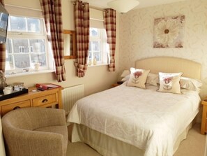 Blackout curtains, iron/ironing board, free WiFi, bed sheets