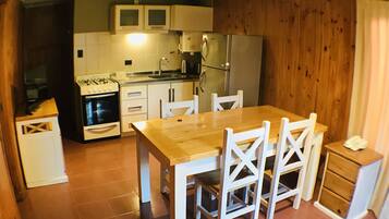 Fridge, microwave, stovetop, cookware/dishes/utensils