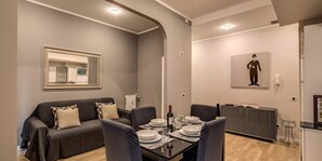 Apartment, 1 Bedroom | Living area | Smart TV - Mecenate Colosseum Suite (Rome)