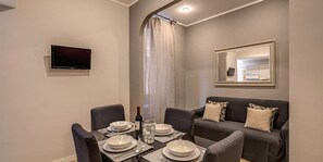 Apartment, 1 Bedroom | Living area | Smart TV - Mecenate Colosseum Suite (Rome)