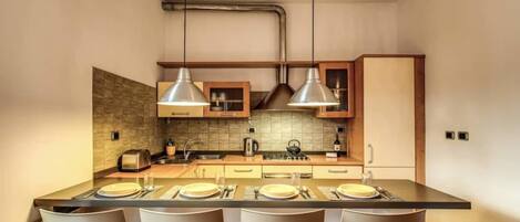 Apartment, 2 Bedrooms | Private kitchen | Fridge, stovetop, cookware/dishes/utensils