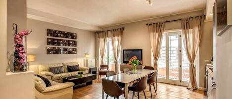 Apartment, 3 Bedrooms | Living area | Flat-screen TV