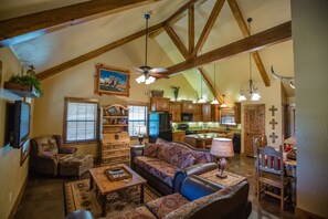 Comfort Cabin (4) | Living area | 40-inch flat-screen TV with satellite channels, TV - NRS Guest Ranch (Decatur)