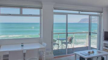 Panoramic Penthouse, Sea View (Oceanfront Penthouse) | Living area | TV