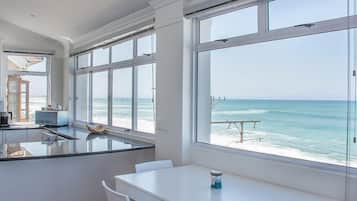 Panoramic Penthouse, Sea View (Oceanfront Penthouse) | Private kitchen | Full-size fridge, stovetop, electric kettle, toaster