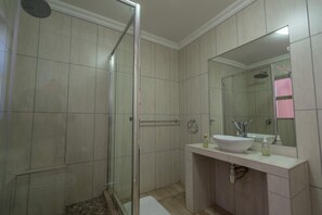 Shower, rainfall showerhead, towels