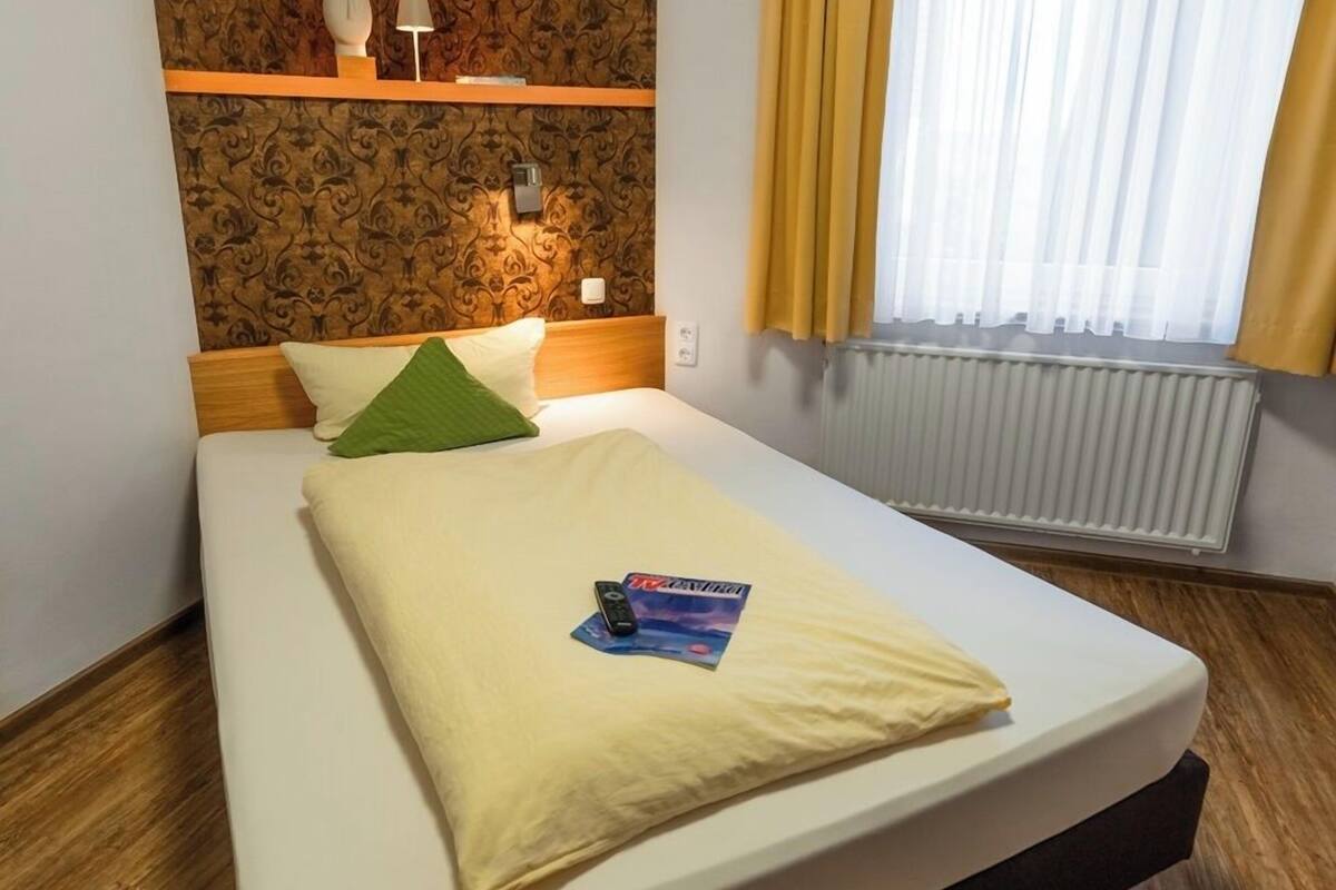 single room | in-room safe, desk, blackout curtains, free wifi