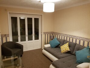 Holiday Home | Living area | Flat-screen TV - Bamburgh Drive Holiday Home (Bedford)