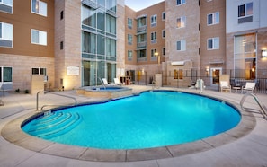 Outdoor pool, open 8:00 AM to 10 PM, pool umbrellas, sun loungers