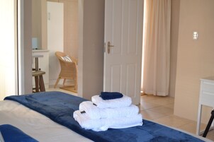 Studio | 2 bedrooms, premium bedding, in-room safe, individually decorated