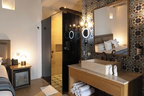 Room, 1 King Bed, Non Smoking, Pool View | Bathroom | Shower, rainfall showerhead, hair dryer, bathrobes