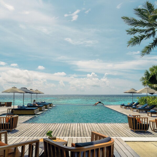 Beach Villa | Pool | 2 outdoor pools, sun loungers