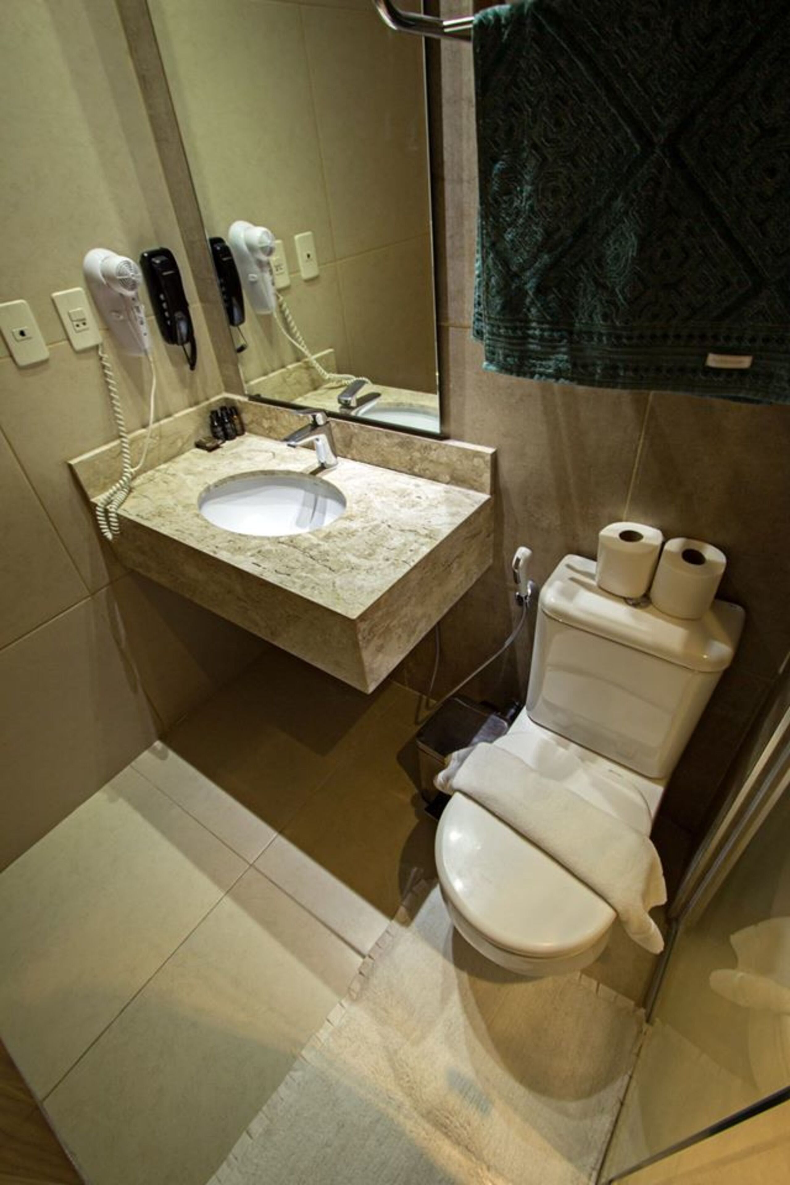 shower, free toiletries, hair dryer, towels