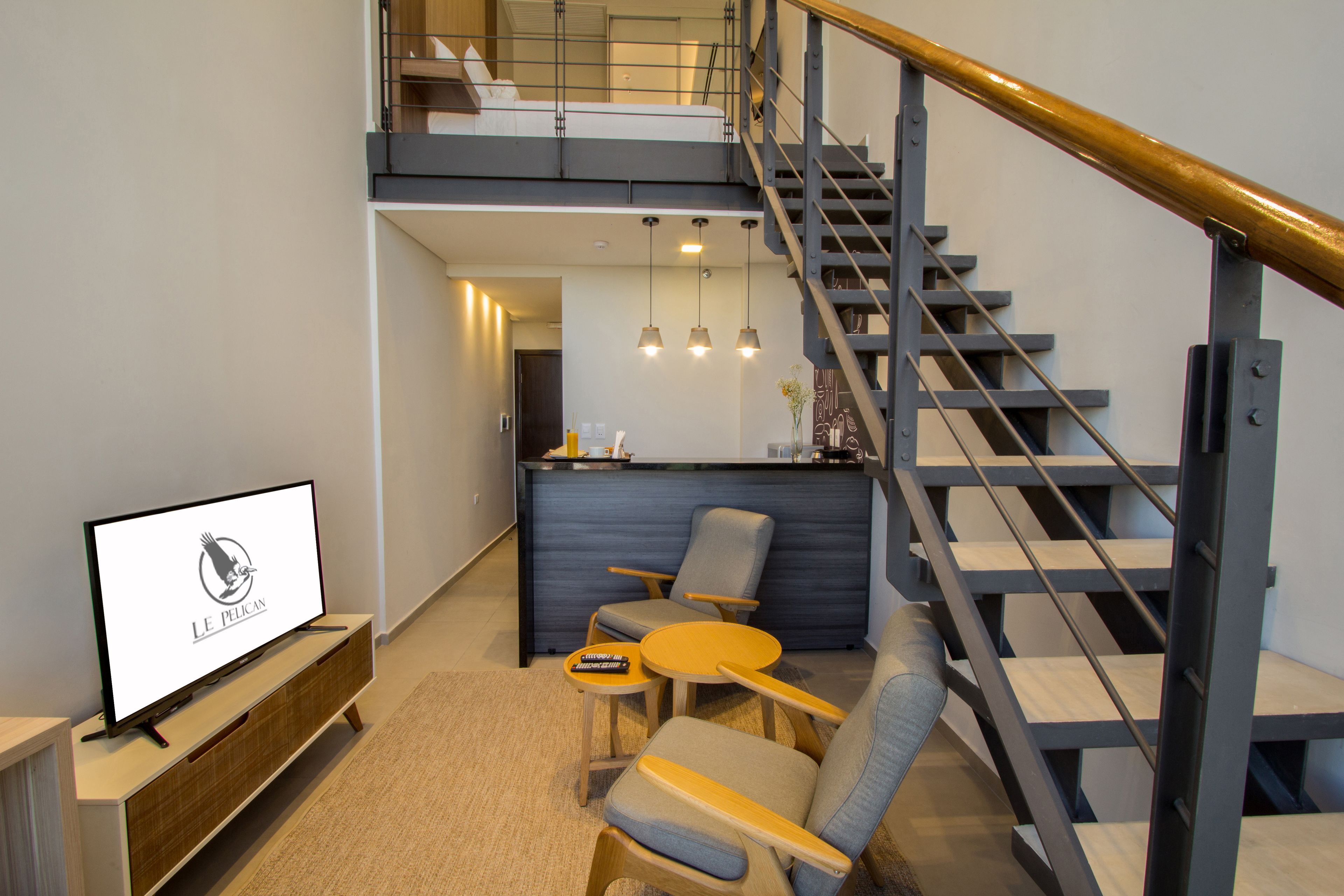 exclusive loft, 1 double bed, non smoking | living area | flat-screen tv