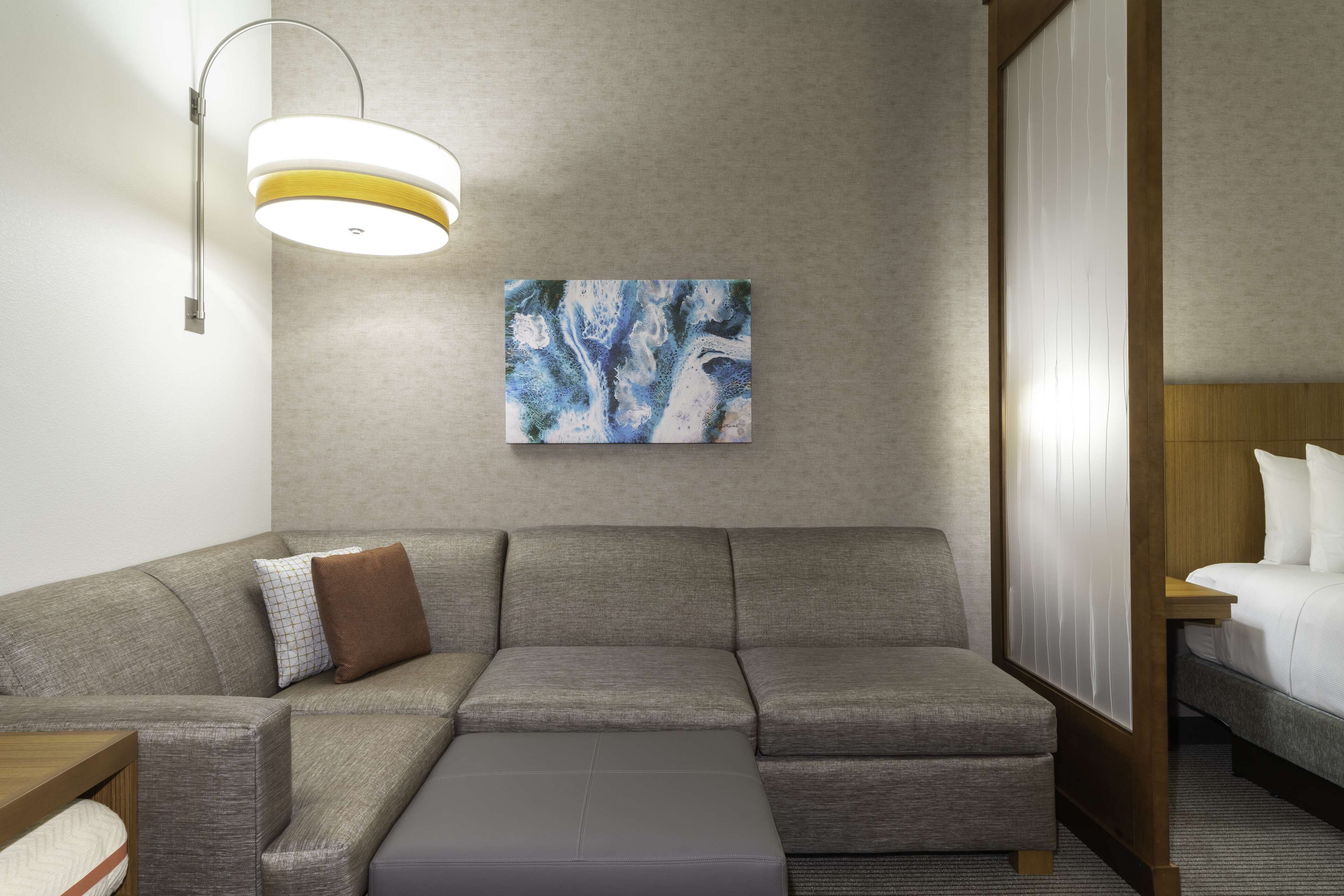 hypo-allergenic bedding, down duvets, pillow-top beds, in-room safe