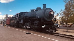 A steam locomotive with the number 539 on a brick-paved platform. - Williams AZ Hostel (Williams)