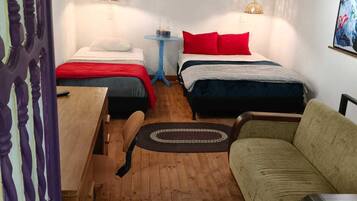 Family Quadruple Room, Multiple Beds, Garden View | Premium bedding, down comforters, Select Comfort beds