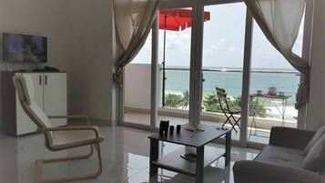 2-Bedroom Apartment  | Living area | Flat-screen TV
