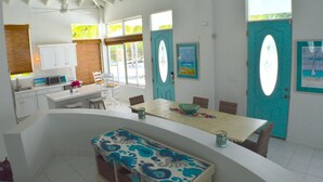 Deluxe Villa, 3 Bedrooms, Jetted Tub, Pool View | Living area | Flat-screen TV, DVD player - Beach Daze (Providenciales)