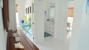 Deluxe Villa, 3 Bedrooms, Jetted Tub, Pool View | Living area | Flat-screen TV, DVD player - Beach Daze (Providenciales)