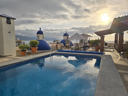 Authentic Mexican charm steps from the beach in the heart of the romantic zone.
