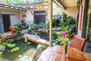 Oasis is a unique tropical escape, built around a waterfall garden courtyard