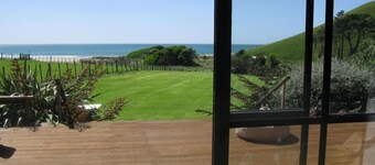 'Time Out'  Beach Front getaway with amazing sea views