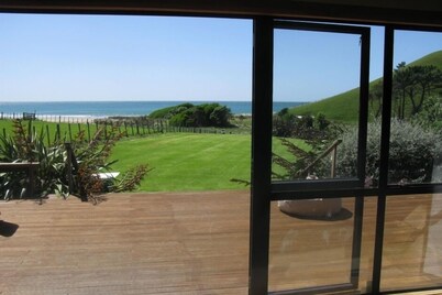 'Time Out'  Beach Front getaway with amazing sea views