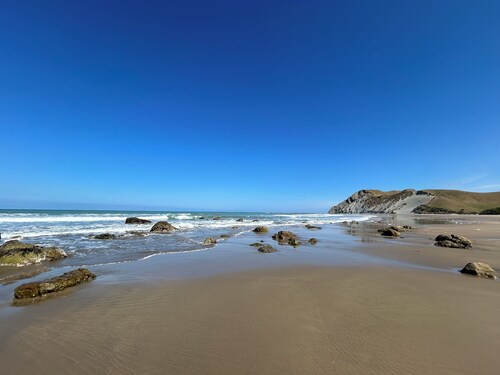 'Time Out'  Beach Front getaway with amazing sea views