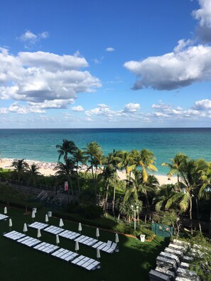 On the beach, sun-loungers, beach towels