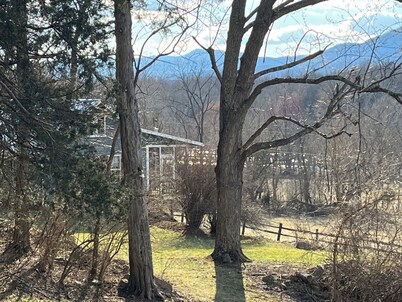 Charming 1800s Farmhouse on 47 Acres — Riverfront w/Views, Hot Tub, Pet-Friendly