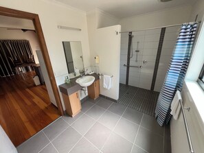 Shower, hair dryer, towels, soap