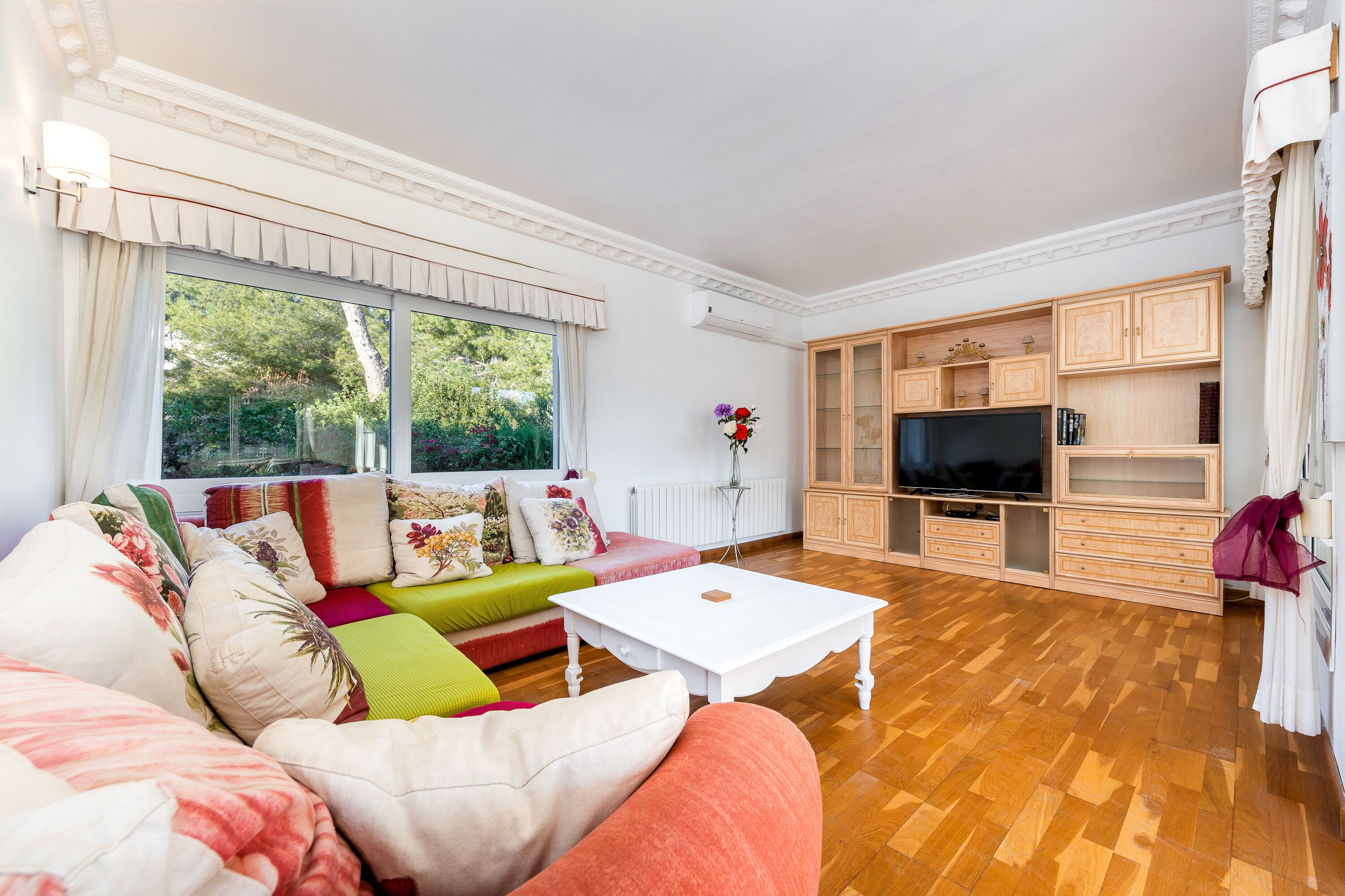 Smart TV, fireplace, books