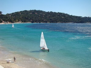 On the beach, sun loungers