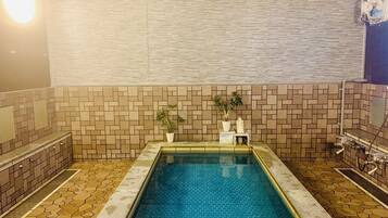 Separate bathtub and shower, slippers, towels