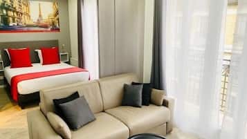 Deluxe Suite, 1 King Bed, Non Smoking | 1 bedroom, individually decorated, individually furnished, desk