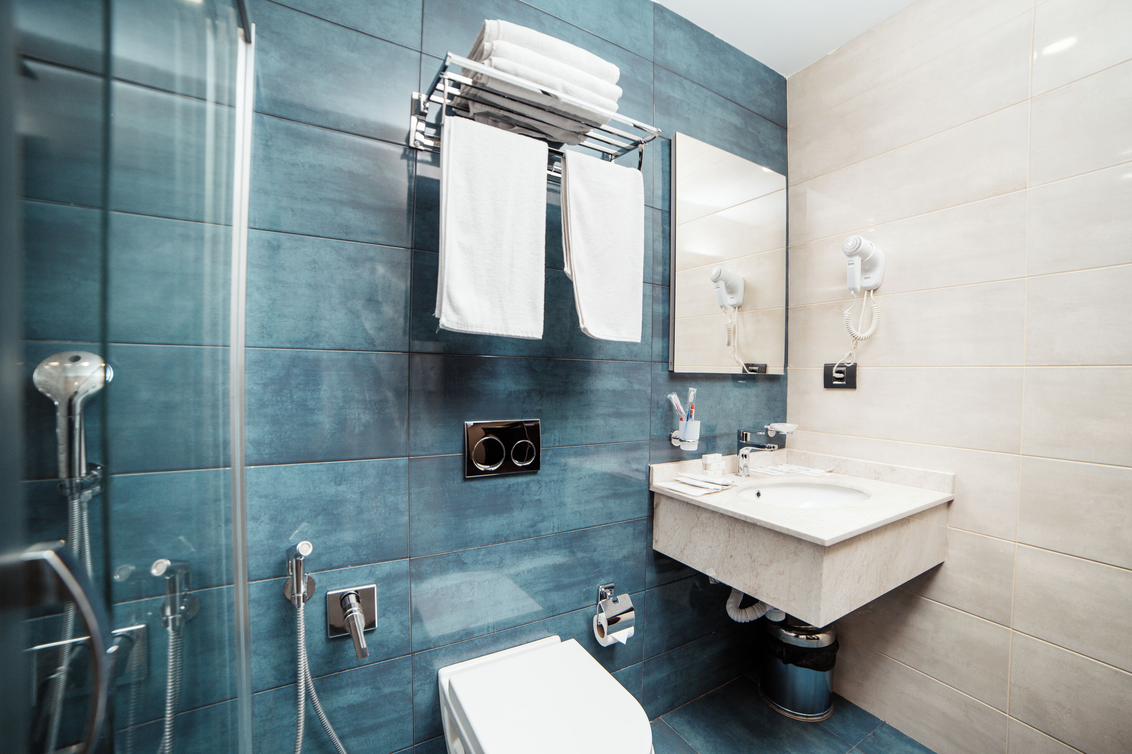 Family Suite, Multiple Beds | Bathroom | Shower, free toiletries, hair dryer, bathrobes