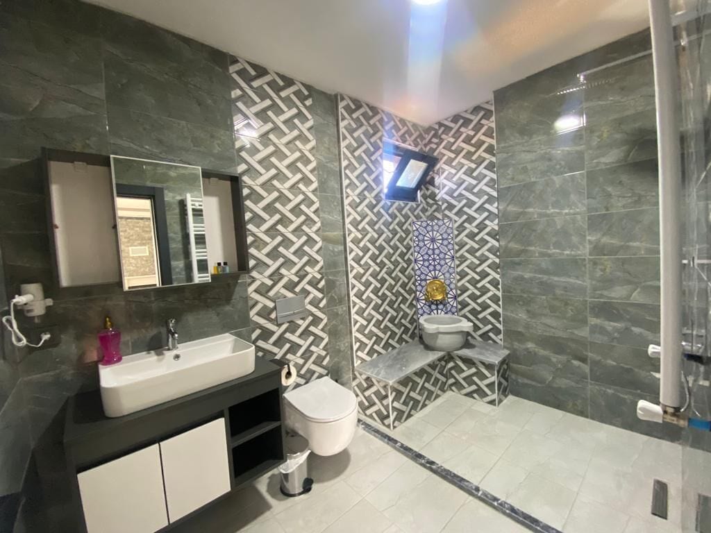 exclusive room, 1 queen bed, lake view | bathroom | shower, free toiletries, hair dryer, slippers