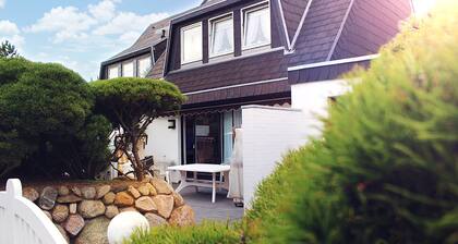 DHH generoso y amigable con terraza y jardín en el corazón de Westerland