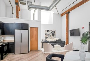 TV - Enjoy extra savings, no rental car needed! Walk to Broadway. Center Stage Loft by Music City Loft. (Nashville)