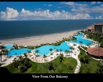 View of Ocean, Gardens, and Infinity Swimming Pool from our balcony