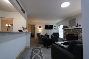 Smart TV, fireplace, DVD player, books