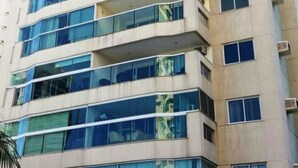 A multi-story building with a modern architectural design, featuring balconies and large windows. - Rio de Janeiro Season. Bora Bora Barra - Complete Leisure Resort - Barra da Tijuca - RJ (Rio de Janeiro)