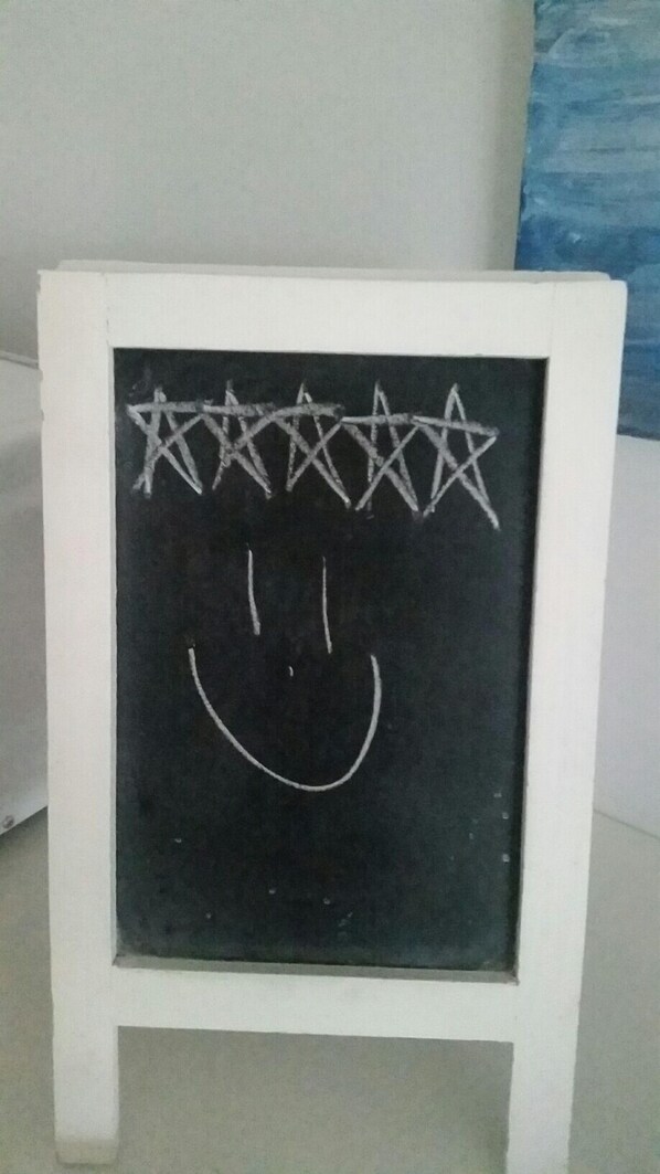 A framed blackboard with a smiley face drawn on it. - Sapphire Beach - Pet Friendly - Beach 5 Minute Walk (Sapphire Beach)
